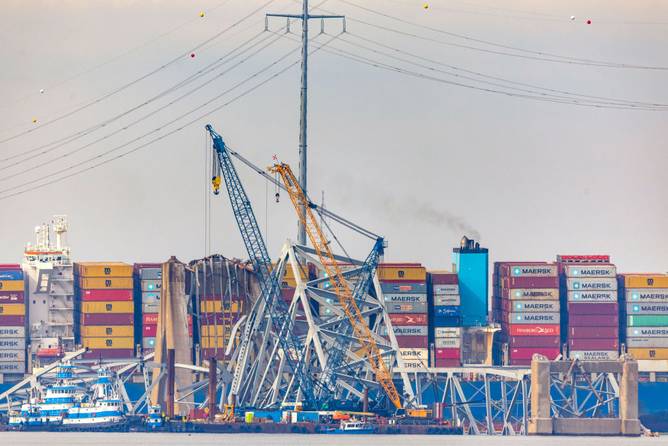 Debris is cleared from the collapsed Francis Scott Key Bridge as efforts begin to reopen the Port of Baltimore