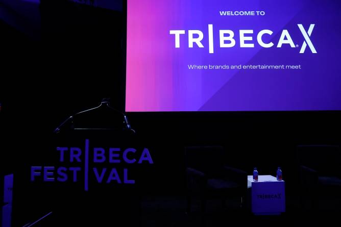 a stage hosting a TribecaX talk  
