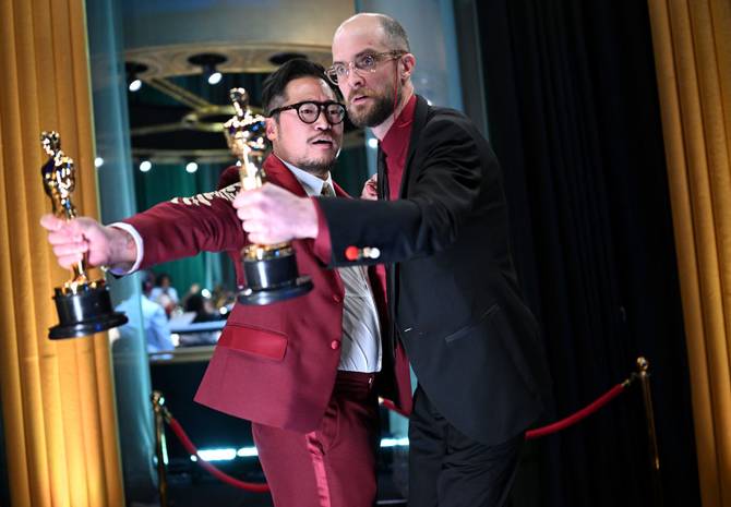 In this handout photo provided by A.M.P.A.S., Best Original Screenplay winners for "Everything Everywhere All at Once," Daniel Kwan and Daniel Scheinert are seen backstage during the 95th Annual Academy Awards