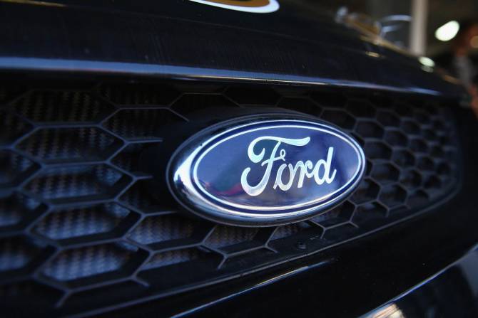 Ford name badge on the front of a truck.