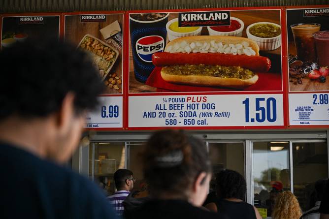 Signage for the Costco Kirkland Signature $1.50 hot dog and soda combo