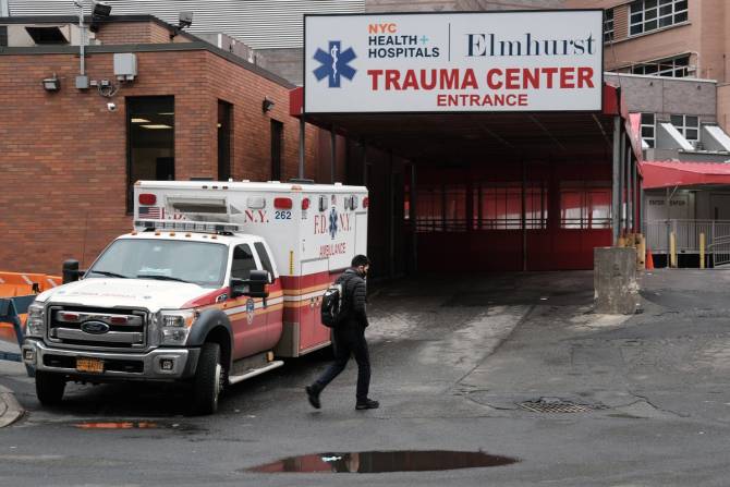 A FDNY EMS truck parks outside Elmhurst Hospital's trauma center.