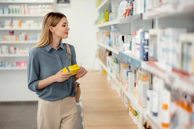 Woman shopping in pharmacy