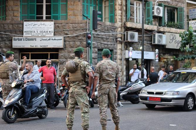 Lebanese soldiers stand guard near a hospital in Beirut