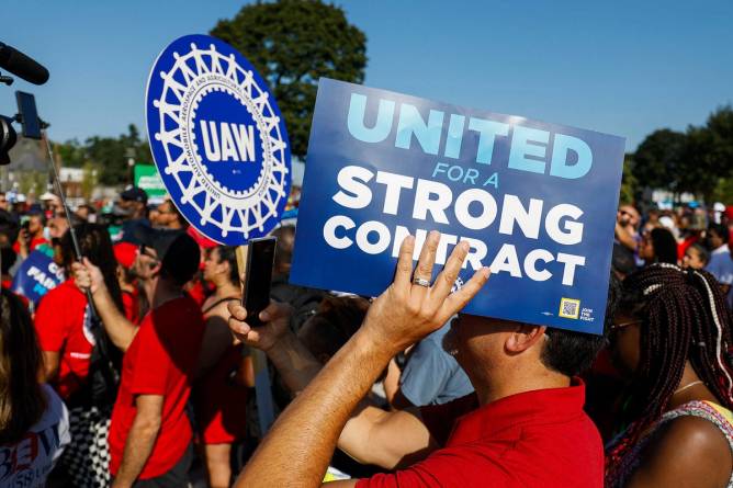 United Auto Workers members rally in Detroit, Michigan