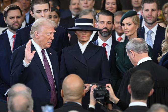 Donald Trump beings sworn into office