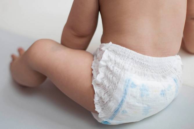A baby's bottom in a diaper
