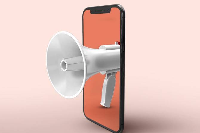 a phone with a megaphone coming out of it