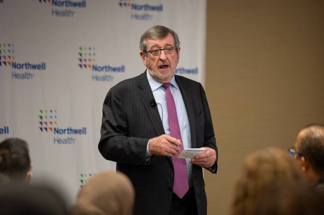 Michael Dowling speaking at a company orientation