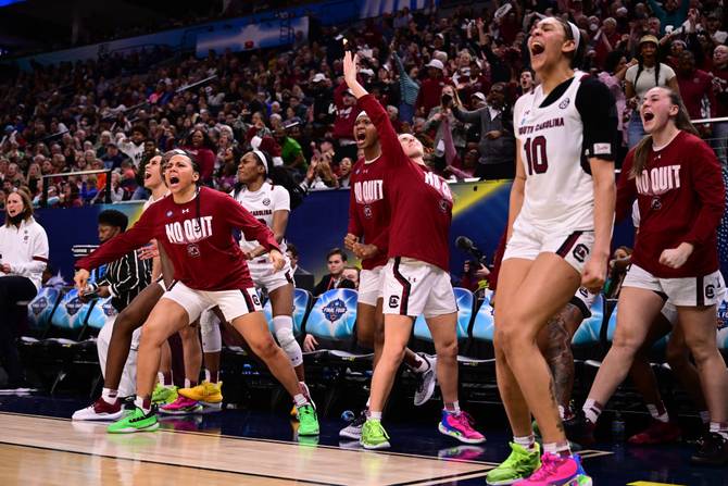 outh Carolina Gamecocks players celebrate a basket against the Connecticut Huskies during the championship game