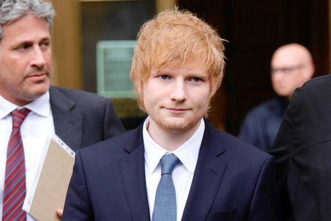 Ed Sheeran in suit.