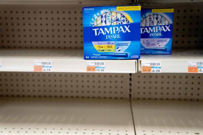Tampax tampons on a nearly empty shelf
