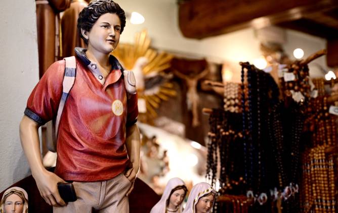 A figurine of new saint Carlo Acutis.