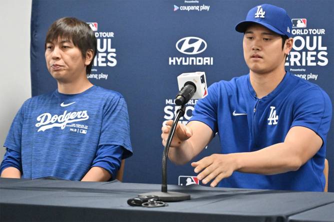 Los Angeles Dodgers’ Shohei Ohtani and his interpreter Ippei Mizuhara attending a press conference