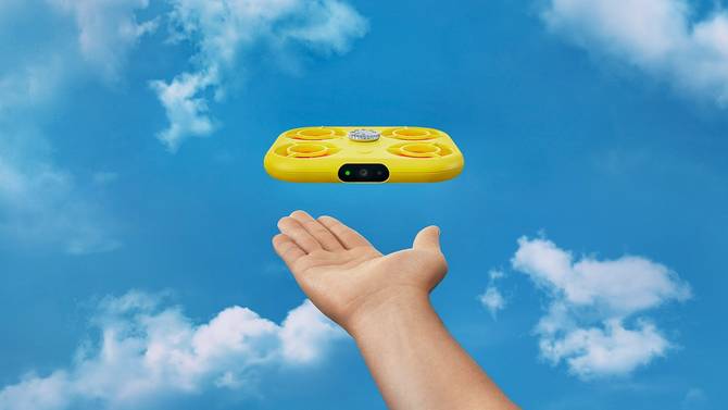 Snap's Pixy drone, against a blue sky