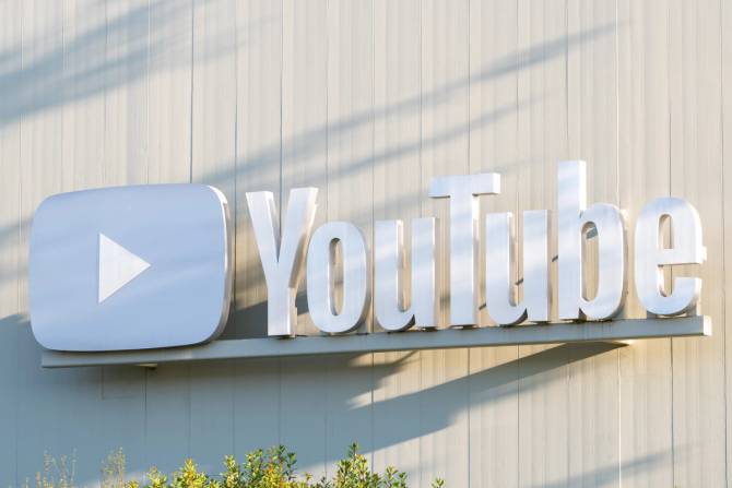 The YouTube logo in white appears on the outside of Google's YouTube Space building in Playa Vista, California.