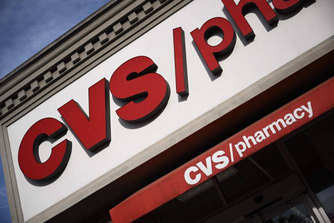 A close up of a retail CVS pharmacy sign.
