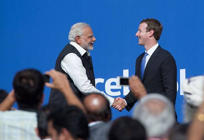 Indian Prime Minister Narendra Modi and Facebook CEO Mark Zuckerberg shake hands