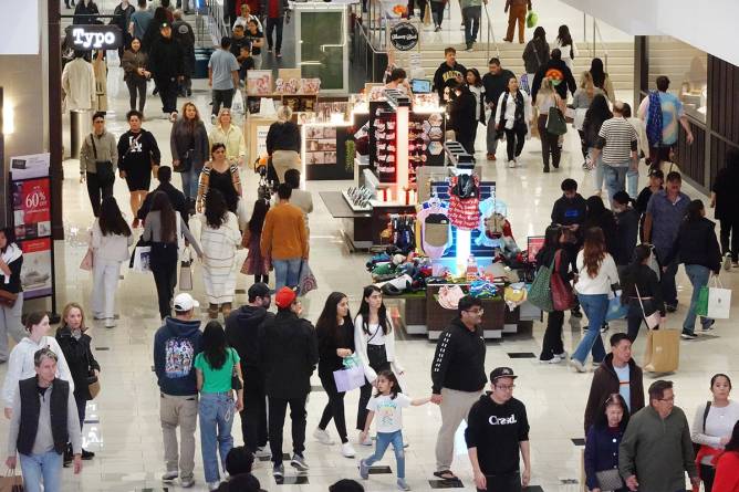 A crowd of shoppers at a mall