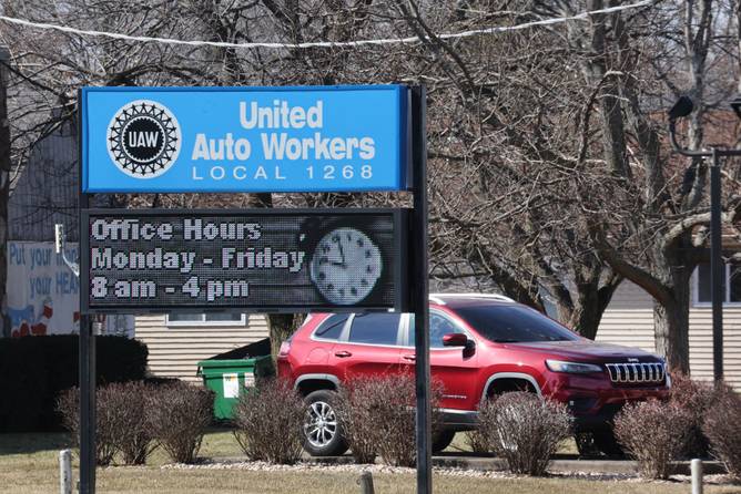 A jeep Cherokee sits in front of the United Auto Workers union hall on February 28, 2023 in Belvidere, Illinois.