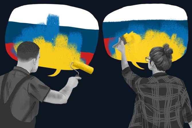 Two people painting Ukrainian flags on Russian flags