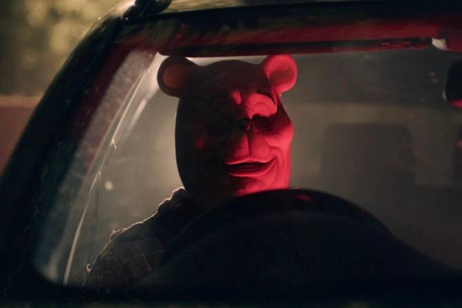 Evil Pooh in a car 