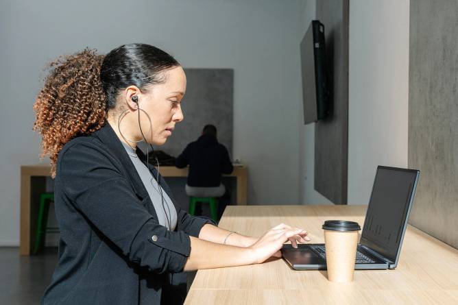 Close-up Portrait of man Working on Computer. Сhart Reflecting in Glasses. Data Analytics Statistics Information Business Technology.