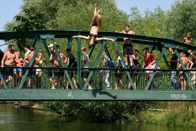 Backflipping off a bridge in the heat