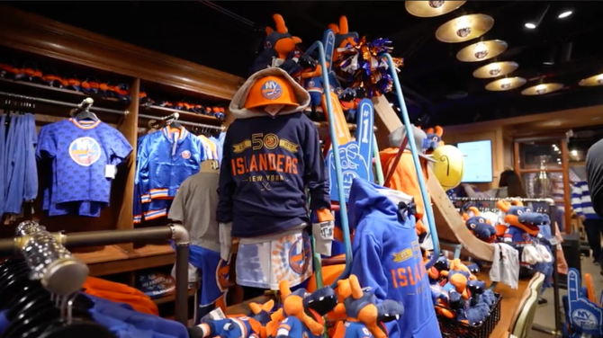 New York Islanders jerseys, hats, and merchandise inside a store