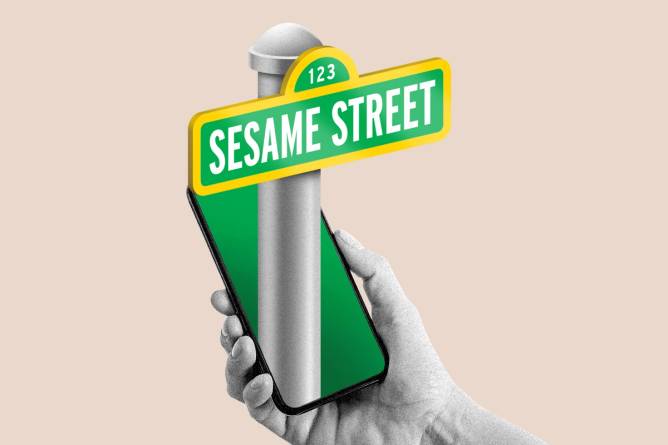 Sesame Street sign emerging from a phone