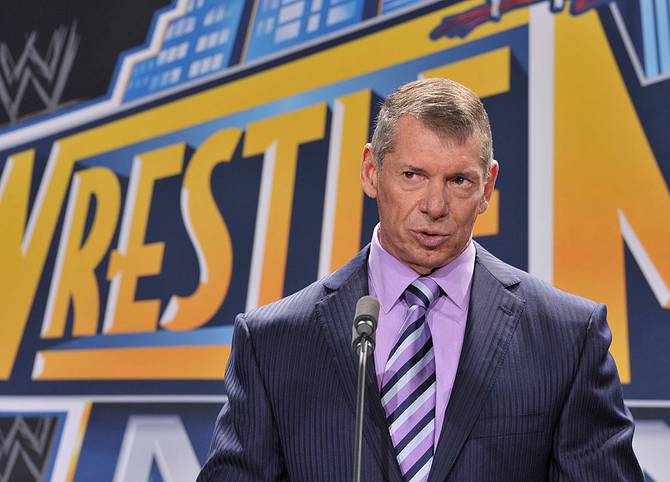 Vince McMahon attends a press conference