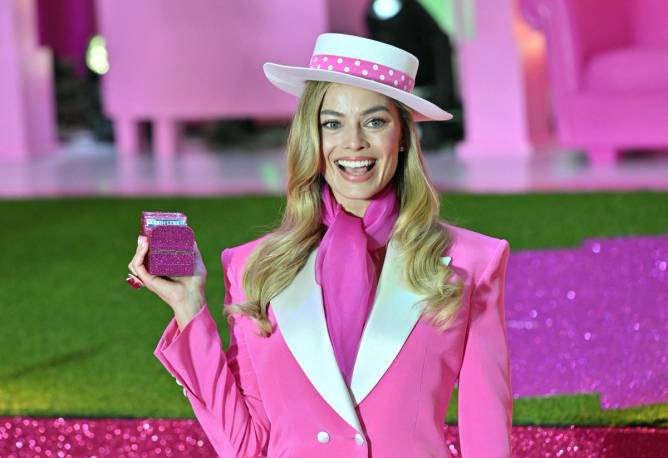 Margot Robbie is dressed in pink in an appearance at a promotional event for the 'Barbie' film