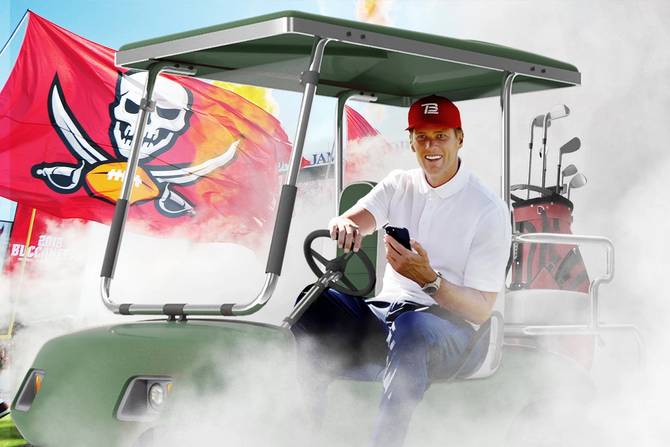 Tom Brady entering the Tampa Bay stadium on a golf cart