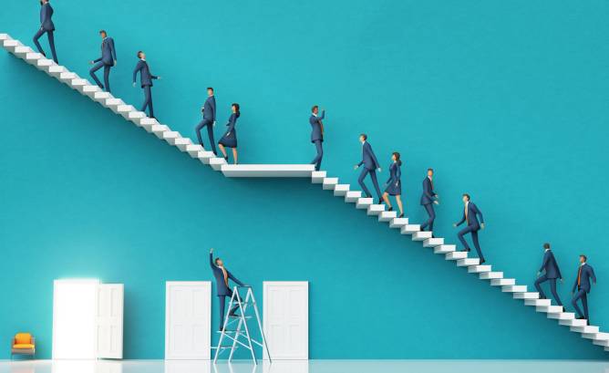 image of workers climbing a staircase and one person on a ladder with no where to go