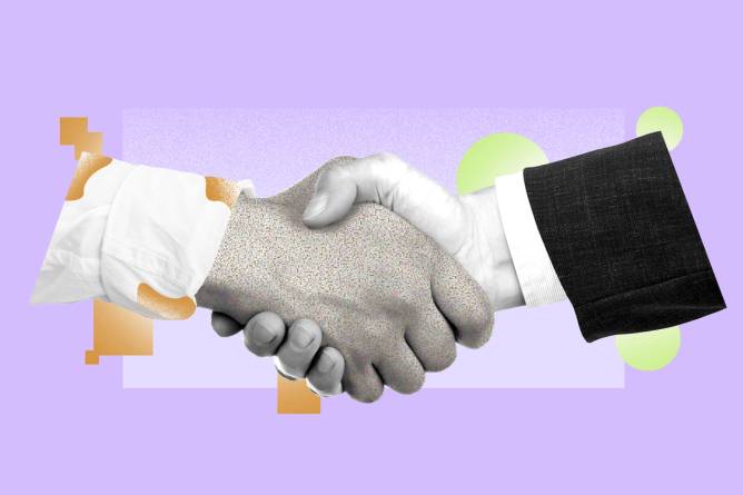 Polished hand with suit shaking a battle hardened textured hand