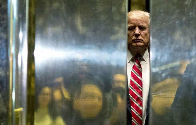 Donald Trump in a closing elevator 