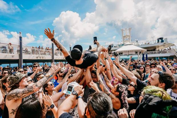 Artist crowdsurfing on Emo's Not Dead cruise