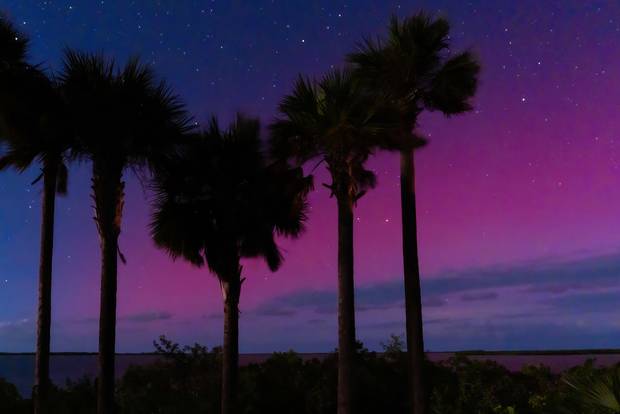 The Northern Lights are seen in Sugarloaf Key, just 15 miles from Key West. According to the Space Weather Prediction Center, a severe geomagnetic storm began Tuesday night, making the lights visible much further south than usual