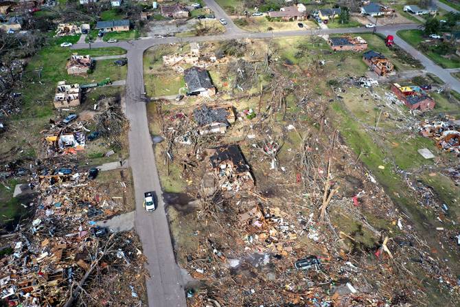 piles of debris remain where homes once stood before Friday's EF-4 tornado on March 26, 2023 in Rolling Fork, Mississippi.