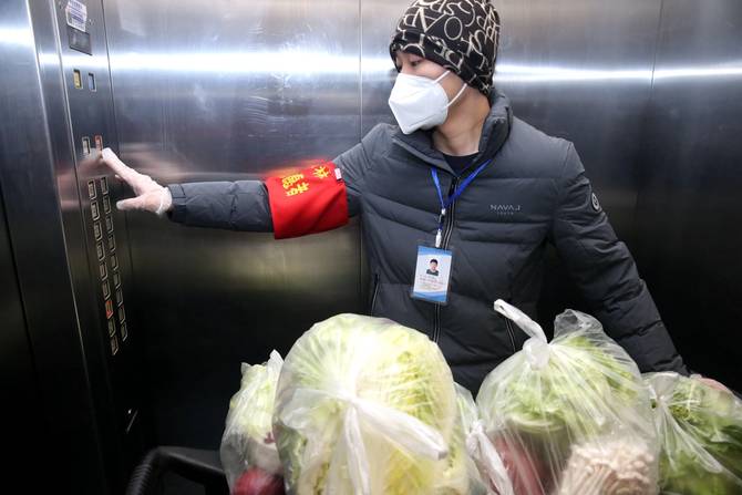 A worker delivers food in Xi'an