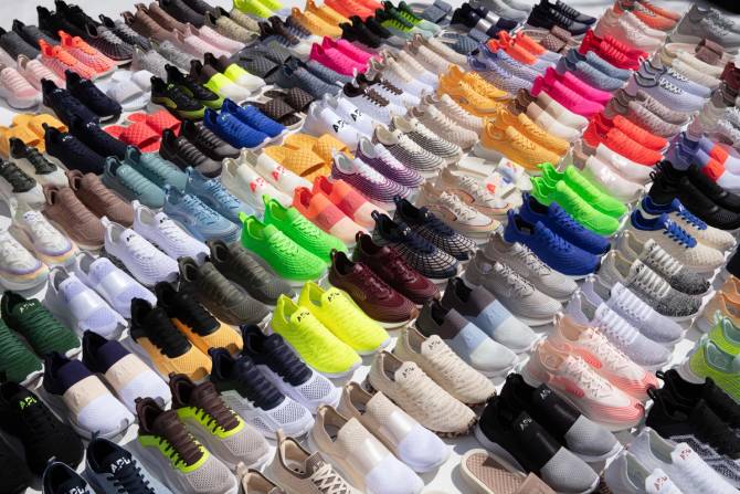 rows of athletic shoes in various colors