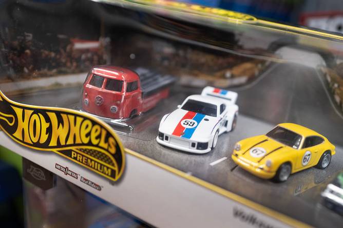 Hot Wheels cars in a display case