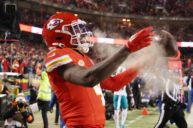 A Chiefs player celebrating in the freezing cold 