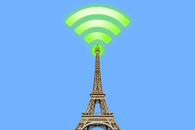 Image of the Eiffel Tower with a wi-fi signal above it. 