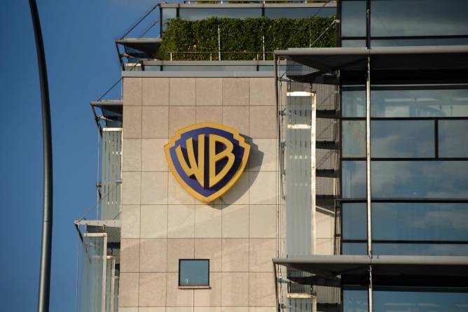 Warner Bros. Discovery logo on the side of a building