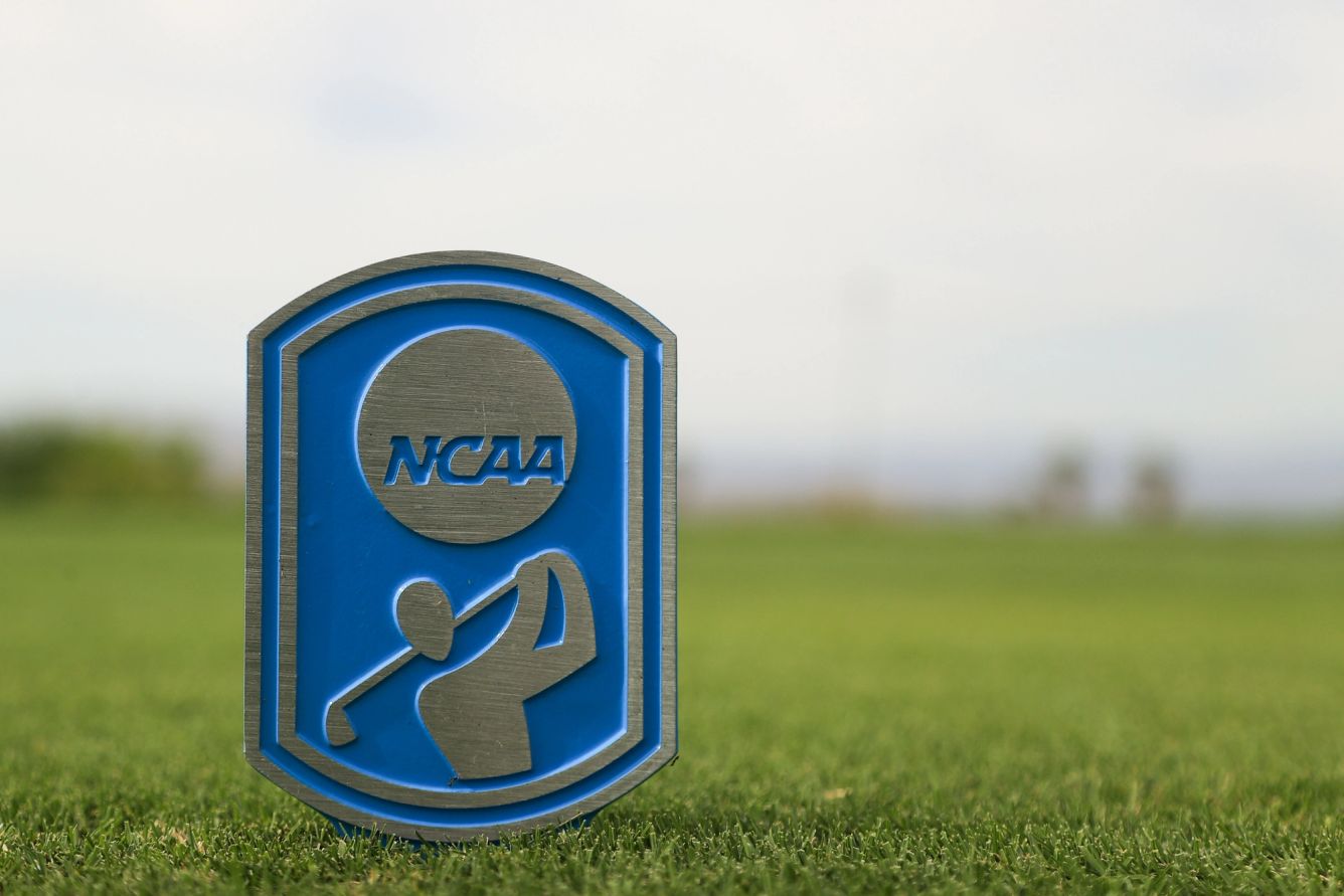 NCAA medallion in the grass