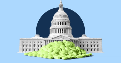 The US capital building with a mountain of pharmaceutical drugs laying in front of it