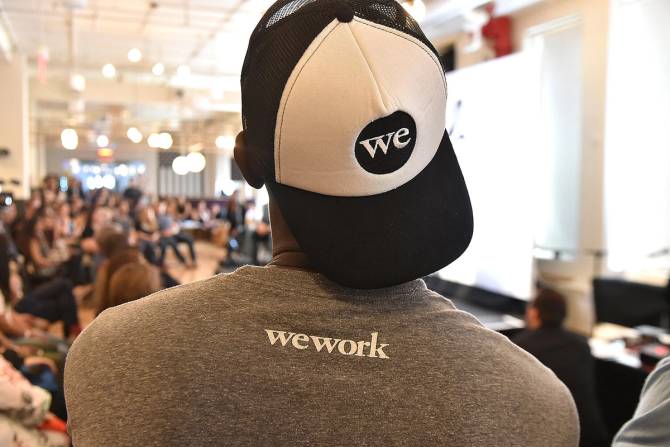 WeWork logo on a hat
