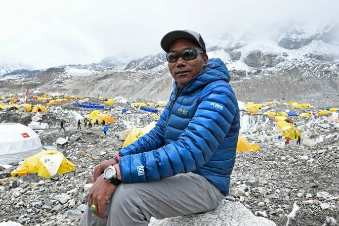 Nepal's mountaineer Kami Rita Sherpa poses for a picture during an interview with AFP at the Everest base camp in the Mount Everest region of Solukhumbu district