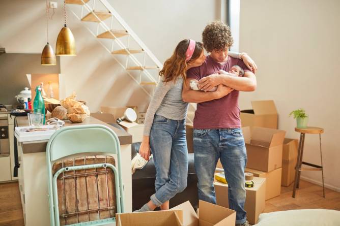 A young couple move into a house with their newborn baby. 